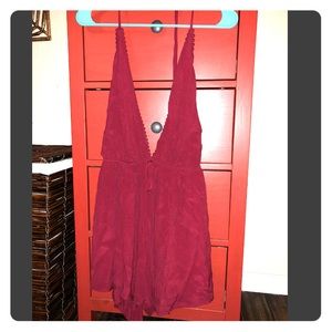Red backless halter romper